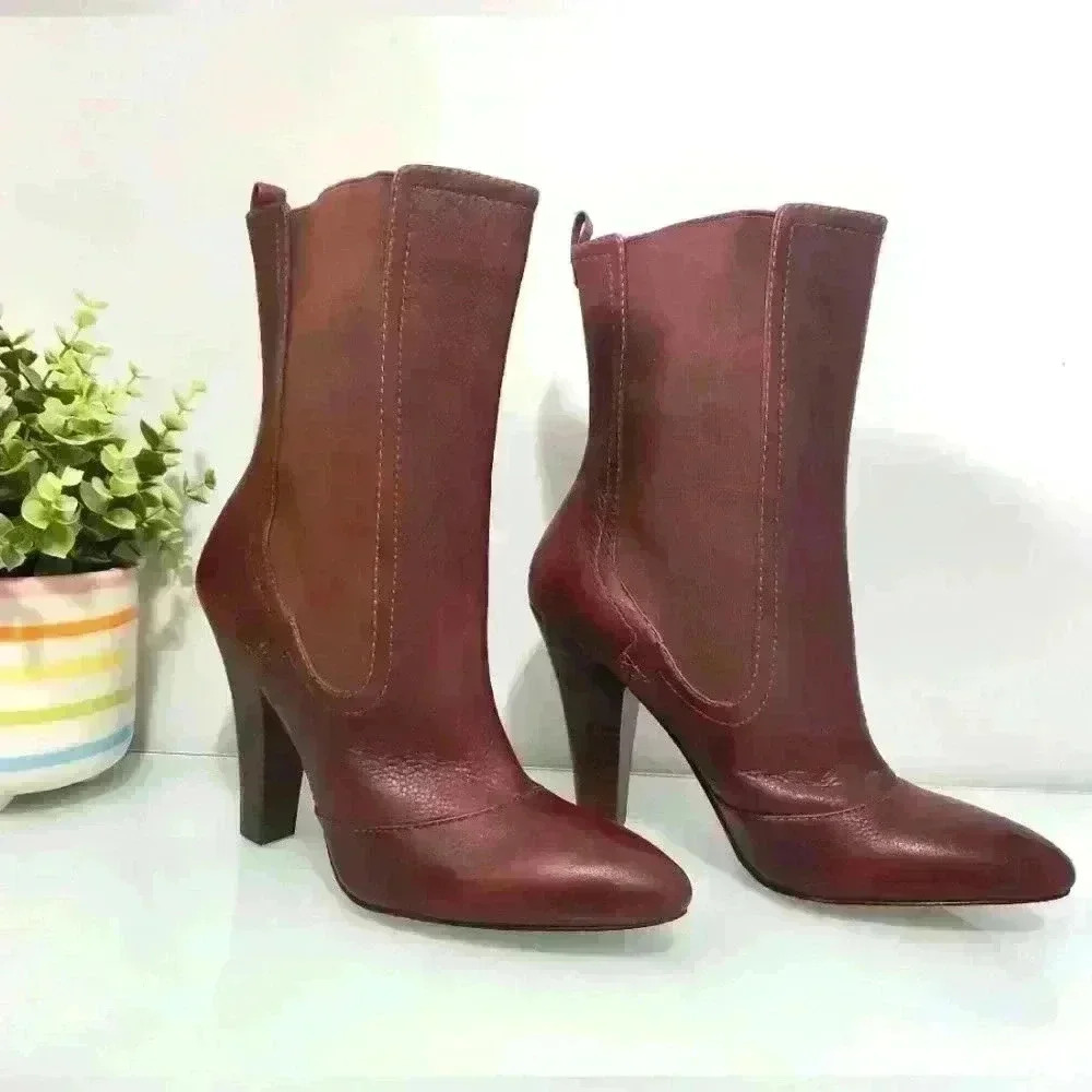 MODERN VINTAGE NWOT merlot leather heeled slip on  boots. Size 38/ 7.5
